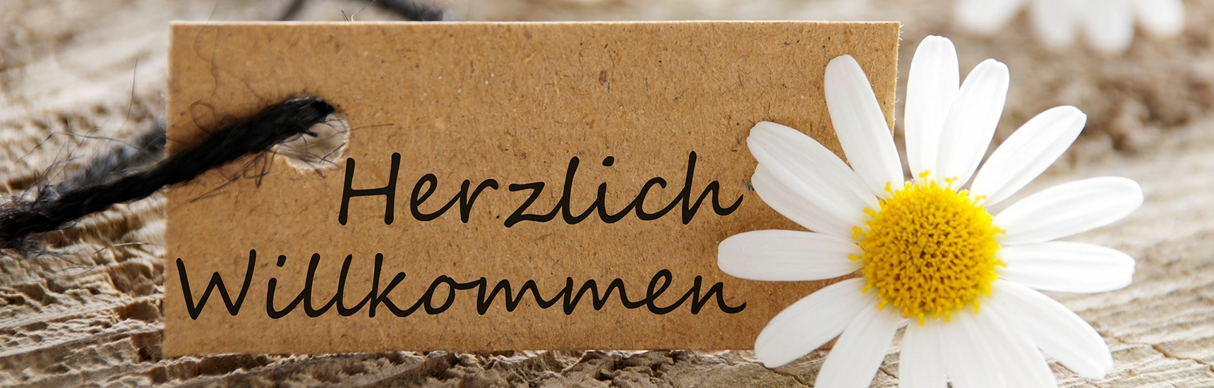 Herzlich Willkommen - Credit: nelos/AdobeStock