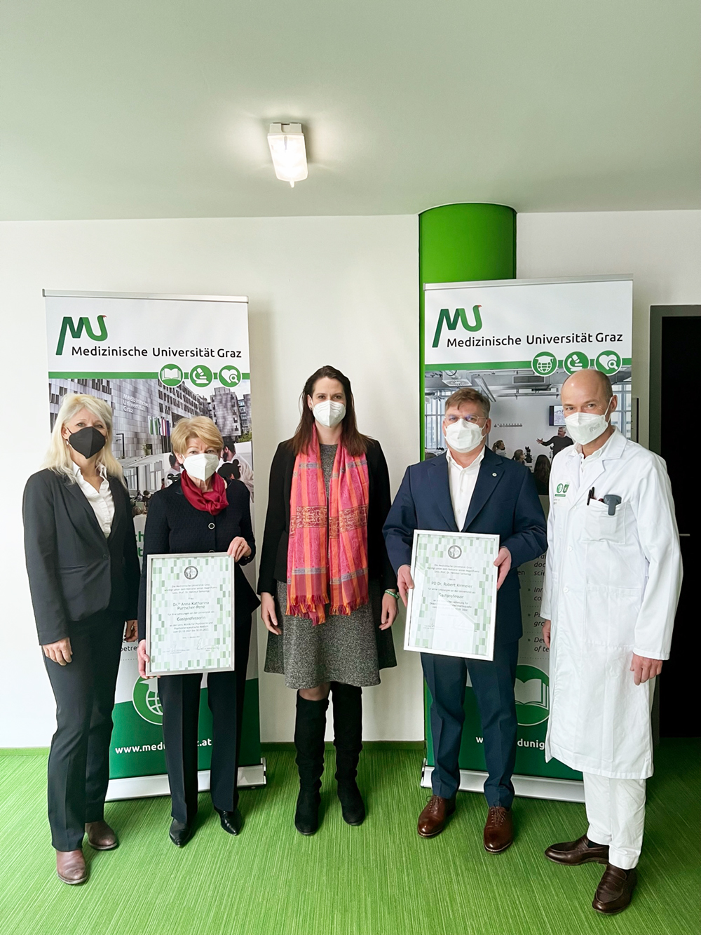 Urkunde für Katharina Purtscher-Penz und Robert Kirmeier 